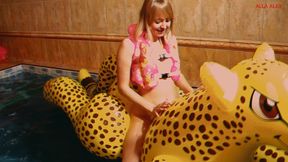 Alla has a hot fuck with a big inflatable cheetah in the pool and wears an inflatable vest for safety!!!