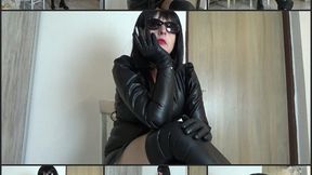 Mistress Angela smokes in a new leather dress