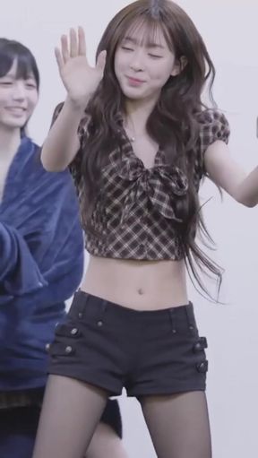 Slim K-pop fan plays with her belly button in a solo