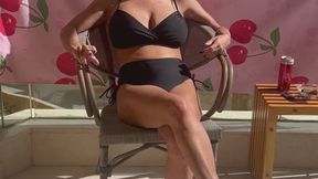 I’m having a nice chilled smoke on the balcony in a nice bikini!