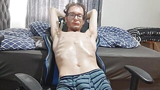 Extremely skinny teen oils up his body and shows his features