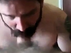 Bearded daddy sucks big hairy cock