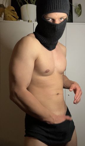 Young hunk flexes his muscles and teases