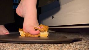 crushing cake with smelly feet