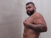 chubby mexican guy with a big dick in the gym showers