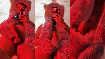 Red fluffy devil with a big uncut cock fills the mirror with cum