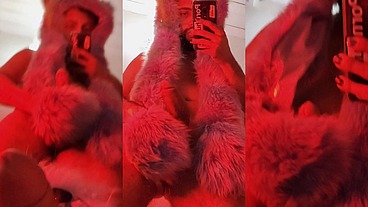 Red fluffy devil with a big uncut cock fills the mirror with cum