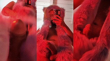 Red fluffy devil with a big uncut cock fills the mirror with cum