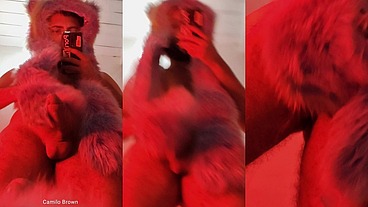 Red fluffy devil with a big uncut cock fills the mirror with cum