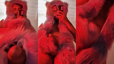 Red fluffy devil with a big uncut cock fills the mirror with cum