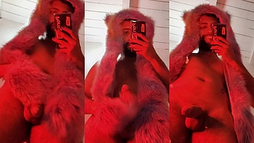 Red fluffy devil with a big uncut cock fills the mirror with cum