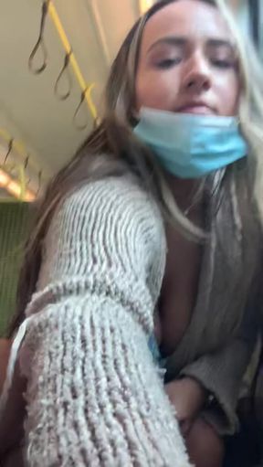 Pretty girl with big tits flashes her hairy pussy in public