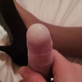 Filling a condom in pantyhose and heels