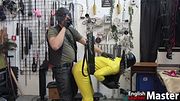 Leather Master fucks rubber gimp & smokes cigar PREVIEW