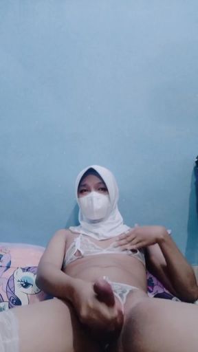 Memorable moment from &quot;Sexy Gay femboy wearing white lingerie with hijab handjob&quot;