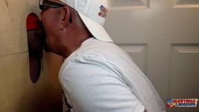 ”Sucking Tatted Daddy At The Gloryhole”