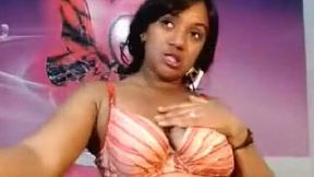 Webcam clip with a chubby Indian hoe kneading her big naturals
