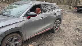 The girl's car got stuck in the mud, she had to call a tow truck to get it out and properly step on the gas and brake with her dirty heels
