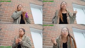 Asian Pinay smoking outdoors in a fur trimmed coat volume 69 Non Nude ****wmv****