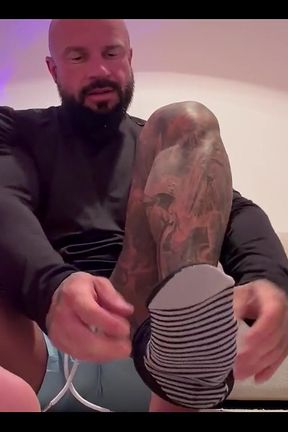 Releasesoccer Player Gets Ready for Game While His Feet in Your Face