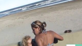 2 Girl blowing on a sandy beach. ( Full clip into 4kporn red )