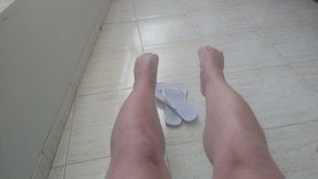 Watch at my beautiful male feet and my white (dirty) Flip-Flops