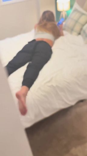 Woman lying on bed