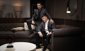 Well suited man fucks his bitch on the couch