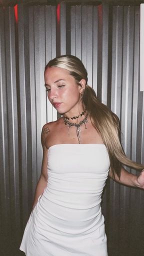 Blonde woman in white dress
