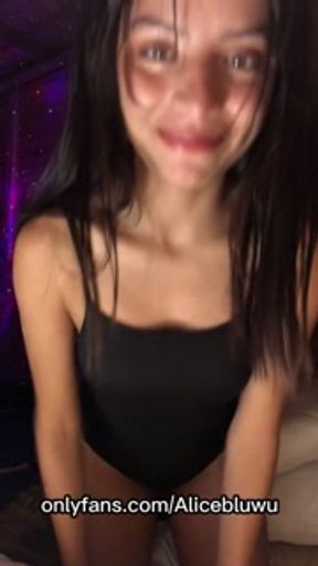 petite brunette latina taking off a piece