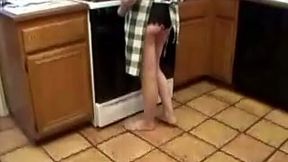 Bosomy fair haired wifey masturbates greedily at kitchen counter