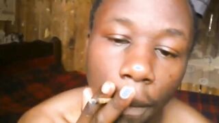 AFRICA LAD SMOKING WEED AND GETTING HIGH