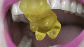 Let gummy bears feel the sharp efges of your wonderful sharp pointiy teeth WMV FULL HD 1080p