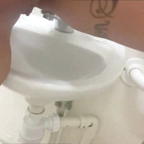 Getting My pussy in the work sink and pissing