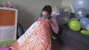 Belle blows up an inflatable