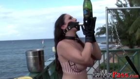 Two dykes dominate and please busty submissive in outdoor latex play