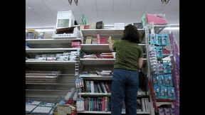 watching a girl looking at books