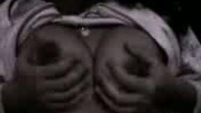 Crappy webcam video of Latina housewife jiggling with her boobs
