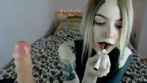 Blonde slut with black lipstick rubs her pussy