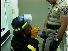 Dick-greedy fireman goes down on a hung policeman and gets a favor in return