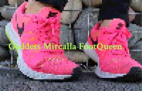 Feet in Pink Athletic Sneakers