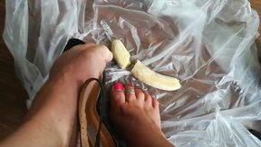My divine feet crush a banana