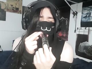 Gal sucking a sex tool with mask