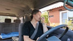 while she is driving, she will clean her nose