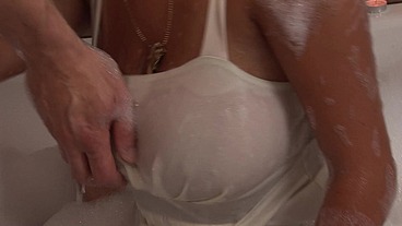 Janett is a busty lady whose husband loves taking bubble baths