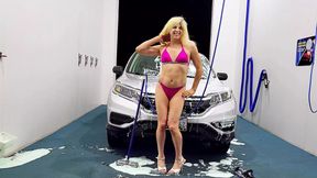 Sissy Denver Shoemaker in a Pink thong Bikini at the carwash