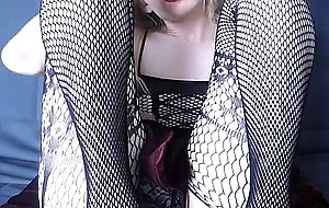 Fishnet webcammer pets her package