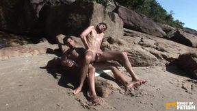 Guy with tattoos bangs a dude with tight asshole on the beach