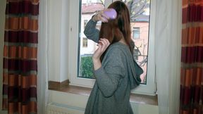 Redhead teen. Brushing hair