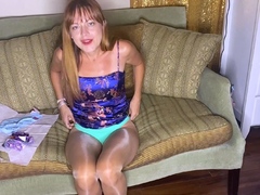 Amateur redhead Jacqueline with glasses masturbates